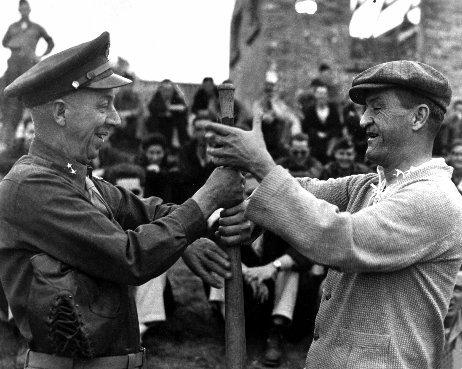 Major General Chenault 1945.jpg - Maj. Gen. Gilbert Cheves (left) and Maj. Gen. Claire Chennault observe a typically American custom to open a softball game in China.  Gen. Chennault pitched for the "Flying Tigers," while Gen. Cheves held down first base for the opposing team.  1945.  (Army)
Exact Date Shot Unknown
NARA FILE #:  111-SC-203553
WAR & CONFLICT BOOK #:  888